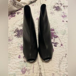 Black front slit high heels